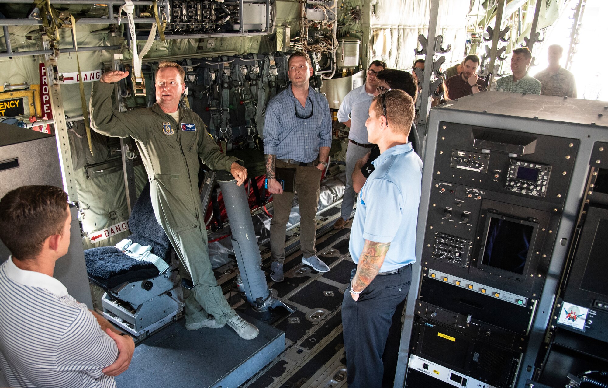 Lt. Col. Sean Cross, 53rd Weather Reconnaissance Squadron instructor pilot, gives a tour of a WC-130J of the 53rd WRS, 403rd Wing, during a base tour for Congressional Staffers from the offices of Senator Wicker, Senator Hyde-Smith and Congressman Kelly on Aug. 6, 2018, at Keesler Air Force Base, Mississippi. The tour gave an overview of the 403rd WG, 81st Training Wing and highlighted the potential issues which may need support. (U.S. Air Force photo by Senior Airman Nathan Byrnes