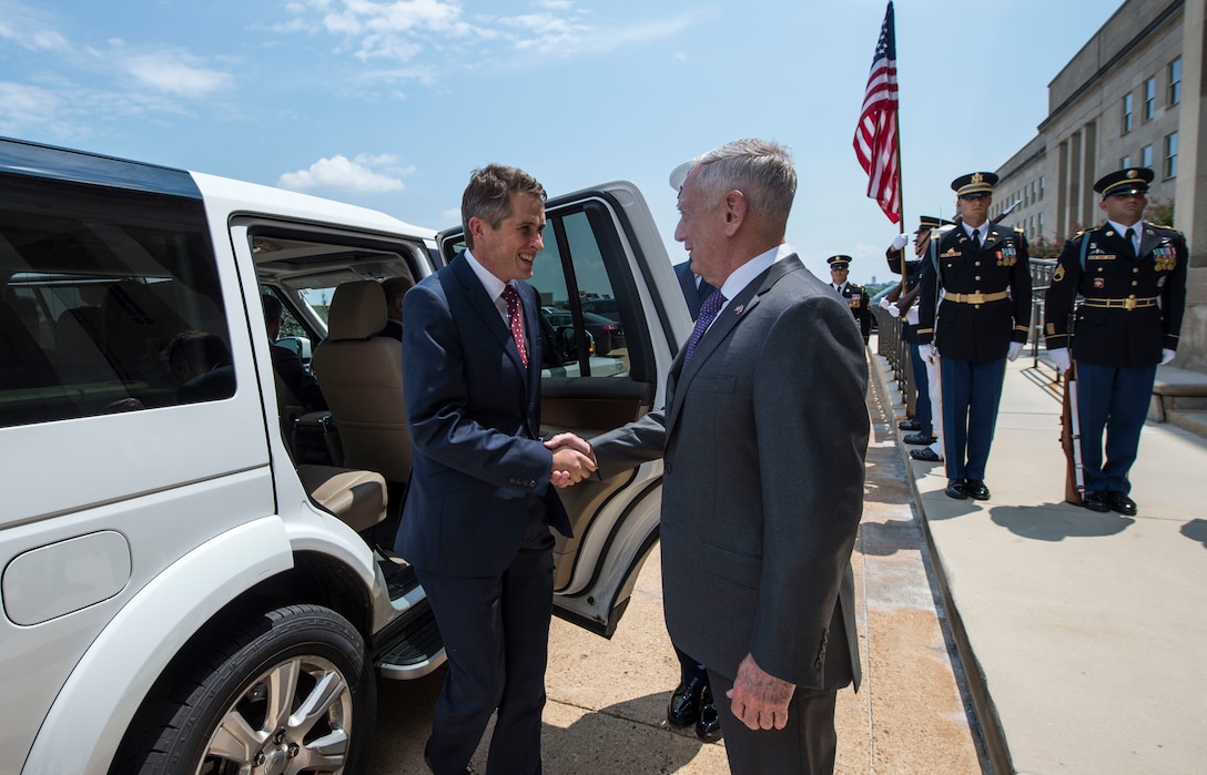Defense Secretary James N. Mattis greets British Defense Secretary Gavin Williamson at the Pentagon.