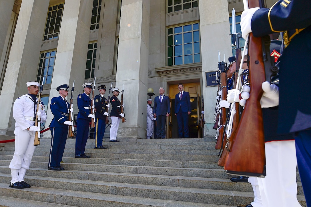 Defense Secretary James N. Mattis welcomes British Defense Secretary Gavin Williamson with an honor cordon at the Pentagon.