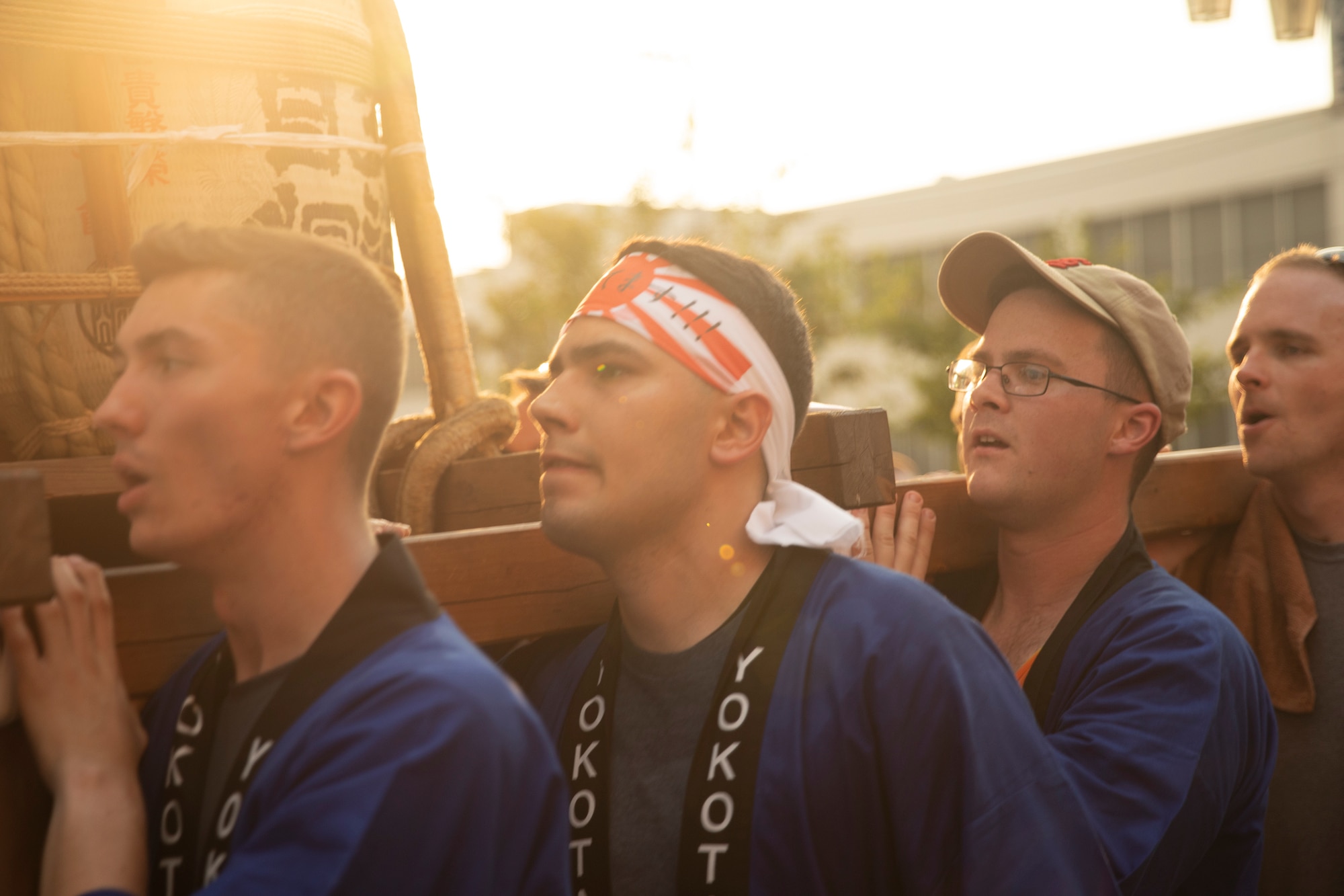 Members from Yokota Air Base carry the 374th Airlift Wing's official mikoshi during the 68th Annual Fussa Tanabata Festival at Fussa City