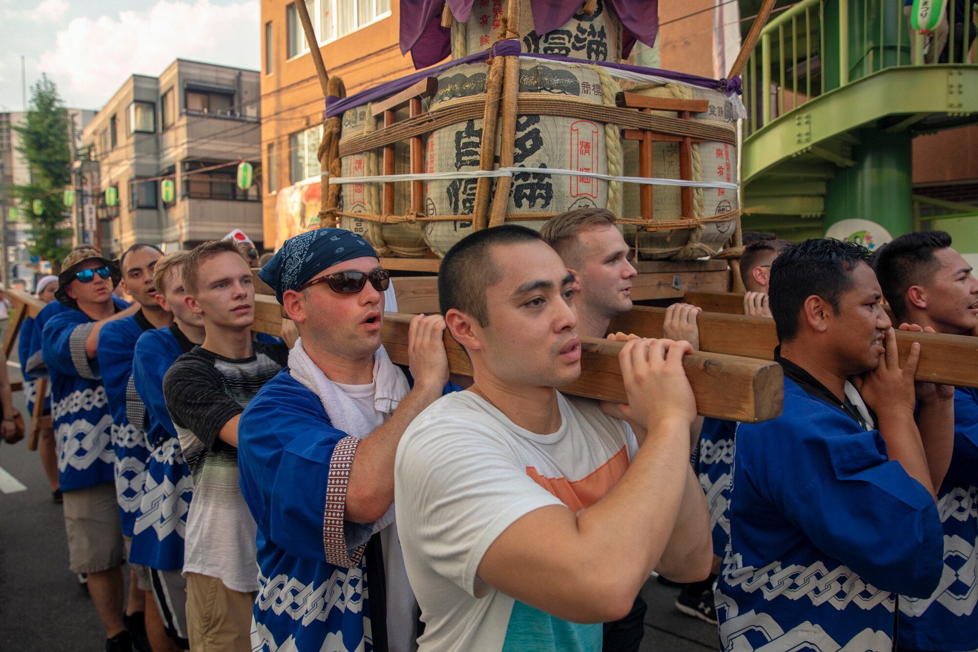 Members from Yokota Air Base carry the 374th Airlift Wing's official mikoshi during the 68th Annual Fussa Tanabata Festival at Fussa City