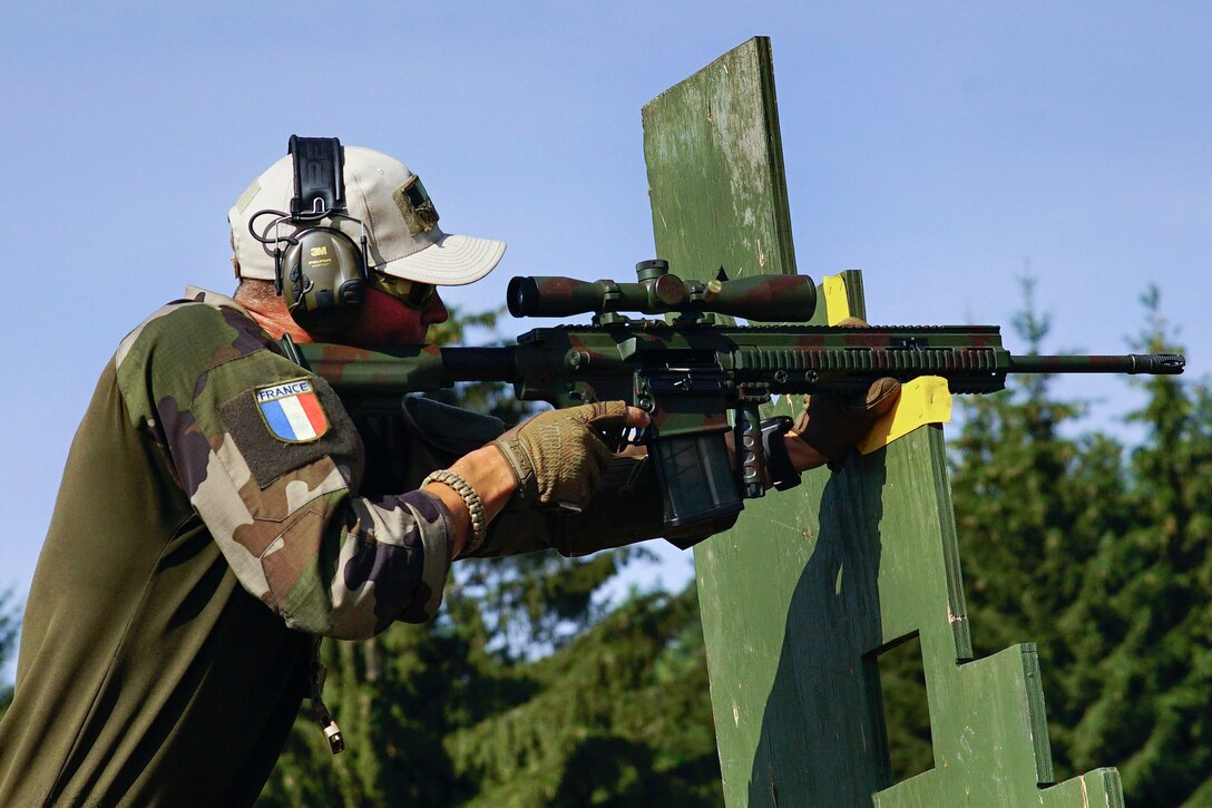 A French sniper engages targets during the stress shoot event.