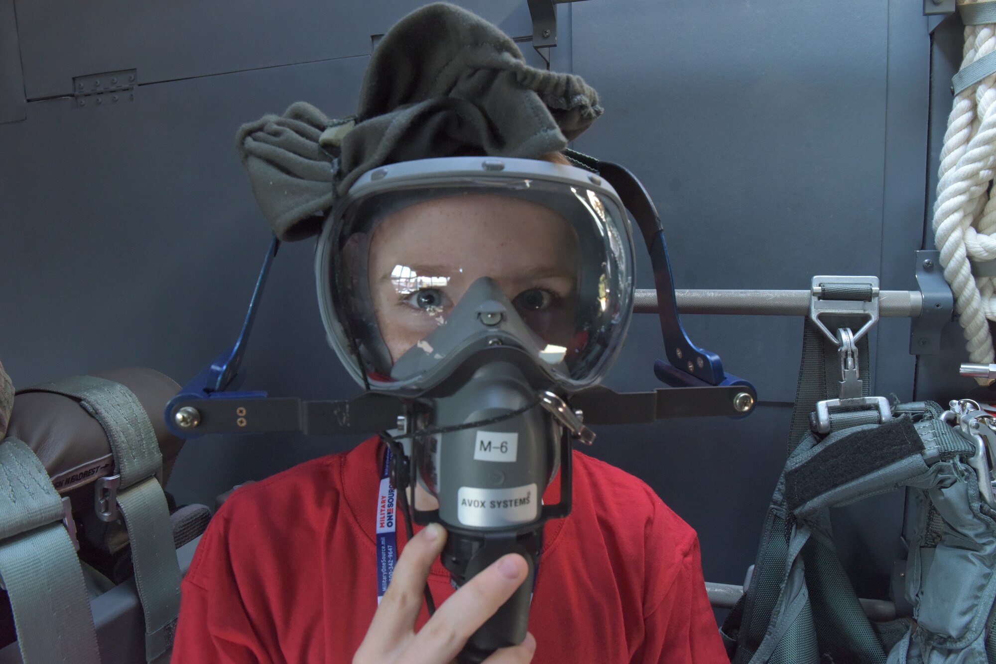 A boy dons an oxygen mask in the cockpit of an MC-130J Commando at RAF Mildenhall, England, Aug. 3, 2018. The children who attended the “kids deployment line,” or Operation Together and Ready, stepped inside two other aircraft: a CV-22 Osprey and a KC-135 Stratotanker. (U.S. Air Force photo by Senior Kelly O'Connor)