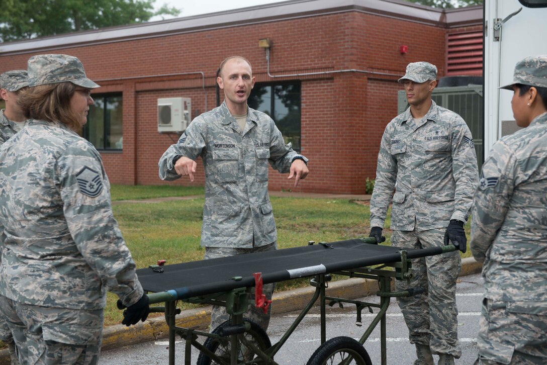 Members of the 934th Aeromdical Staging Squadron train to transport medical patients on litters during the August UTA. (Air Force Photo/Tech. Sgt. Amber E.N. Jacobs)