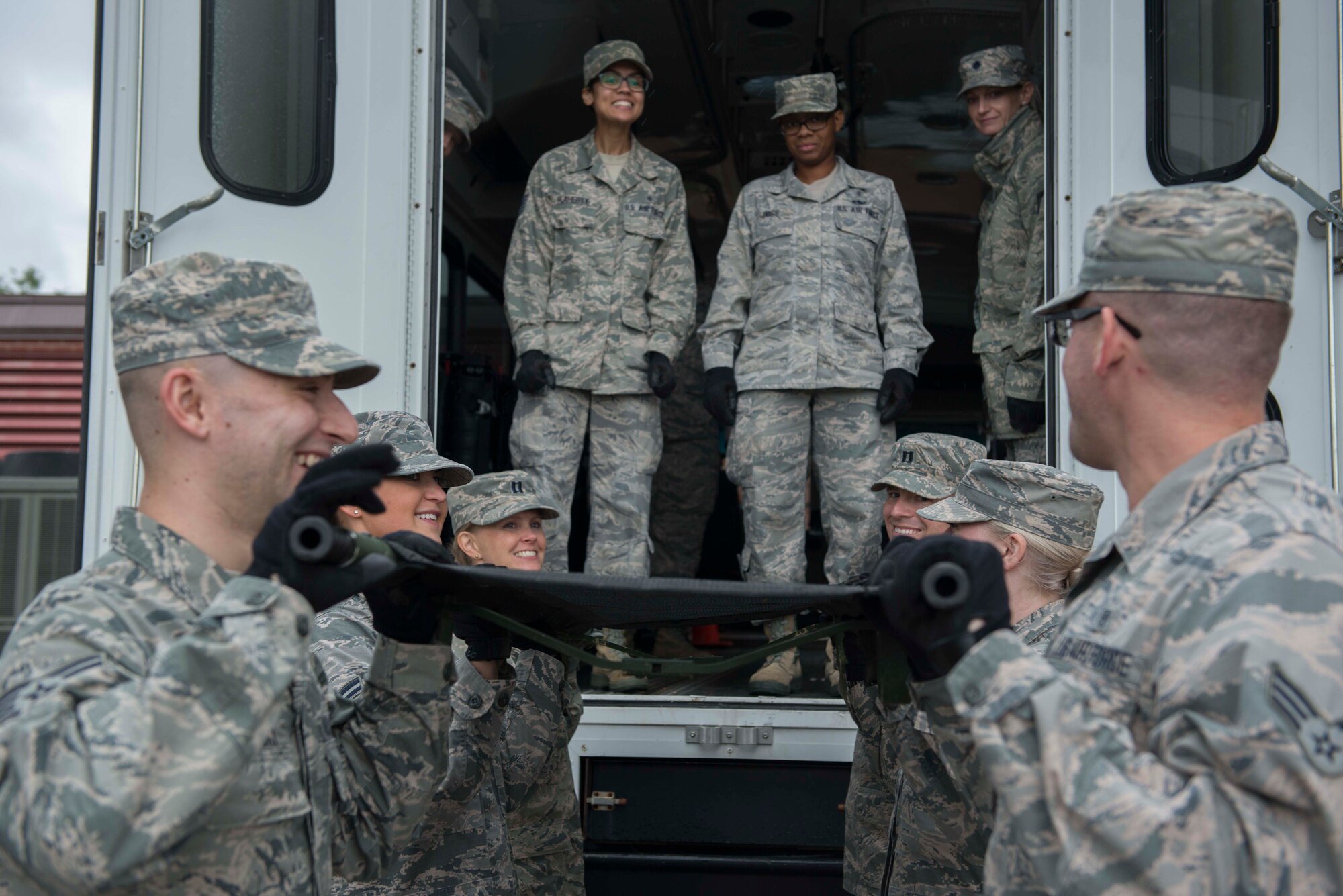 Members of the 934th Aeromdical Staging Squadron train to transport medical patients on litters during the August UTA. (Air Force Photo/Tech. Sgt. Amber E.N. Jacobs)