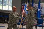 Lt. Col. Christian Capece (middle) commits to taking command of the 130th Force Support Squadron from Lt. Col. Rick Thomas, 130th Mission Support Group Commander (left), as Lt. Col. David Lester (right) relinquishes command Aug. 5, 2018 at McLaughlin Air National Guard Base, Charleston, W.Va. Capece was formerly the 130th Airlift Wing's Staff Judge Advocate, which he served as for the last 10 years. (U.S. Air National Guard Photo by Capt. Holli Nelson)