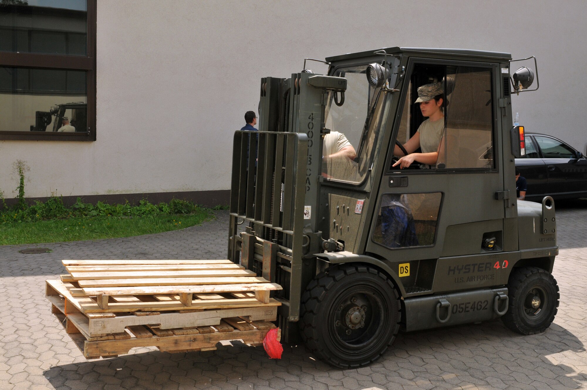 Senior Airman Maria Mammen with the Iowa Air National Guard’s 185th Air Refueling Wing’s Force Support Squadron demonstrates her skills operating a forklift during training at Ramstein Air Base, Germany in June, 2018. Several members of the unit were in German for training alongside their active duty counterparts. U.S. Air National Guard photo by Master Sgt. Bill Wiseman.