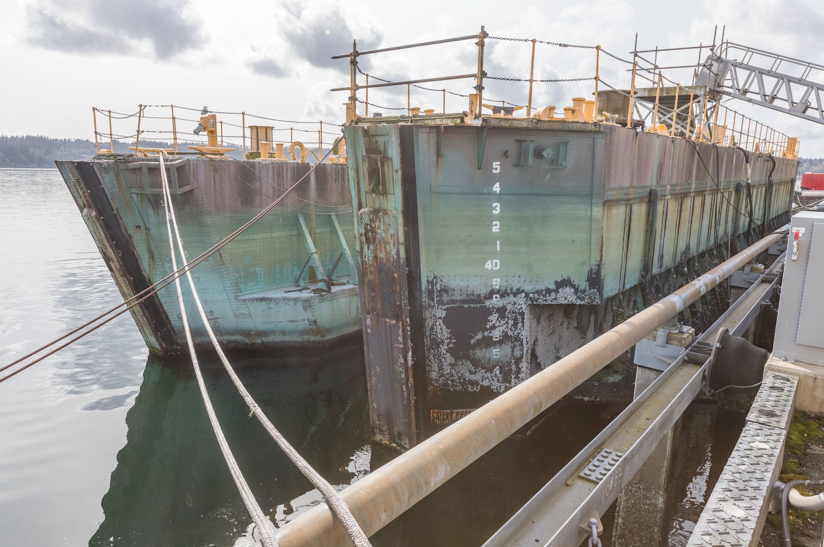 Historic caissons 2 and 3 at Puget Sound Naval Shipyard & Intermediate Maintenance Facility in Bremerton, Wash., in 2018. Two caissons are currently being offered for sale through the Defense Logistics Agency's disposition services.