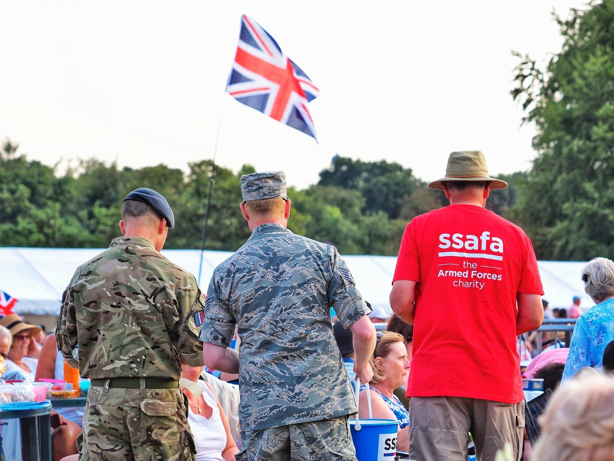 U.S. Air Force Staff Sgt. Jason Chipley (center), 145th Logistics Readiness Squadron, helps with collecting donations for a charity event during Battle Proms at Hatfield Park, Hatfield, United Kingdom, July 14, 2018. The Military Reserve Exchange Program not only allows military members to learn and exchange ideas about their respective career fields, but it also provides the opportunity to be immersed in the host country’s culture.