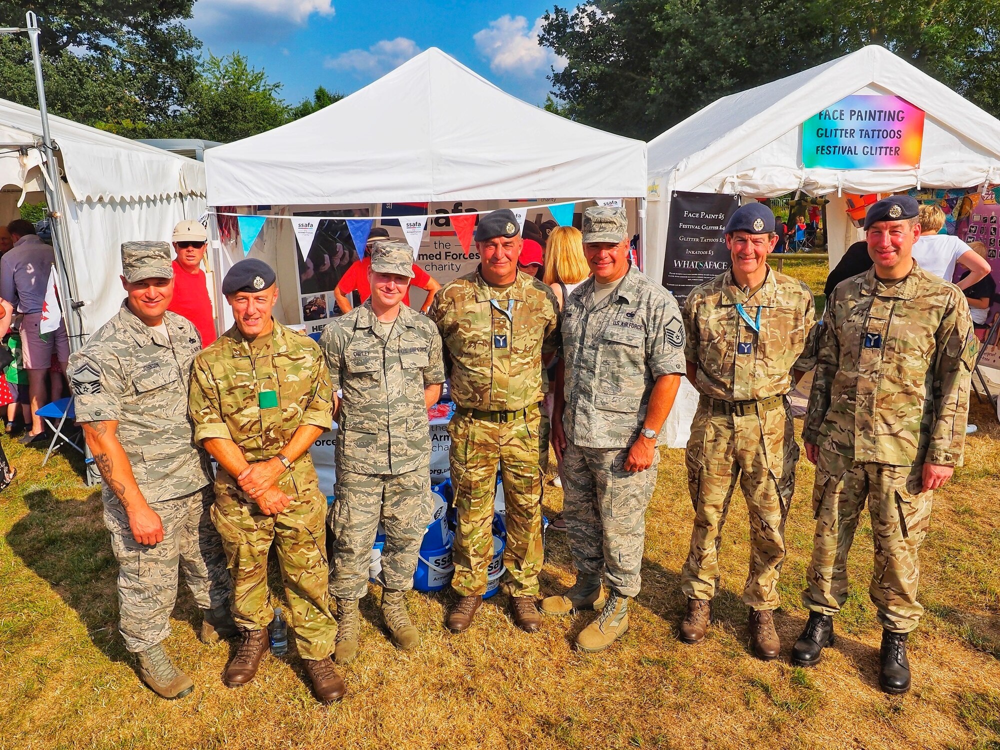 U.S. Air Force Staff Sgt. Jason Chipley (third from left), 145th Logistics Readiness Squadron, poses with members from the United States Air Force Reserves and Royal Air Force during Battle Proms at Hatfield Park, Hatfield, United Kingdom, July 14, 2018. The Military Reserve Exchange Program not only allows military members to learn and exchange ideas about their respective career fields, but it also provides the opportunity to be immersed in the host country’s culture.
