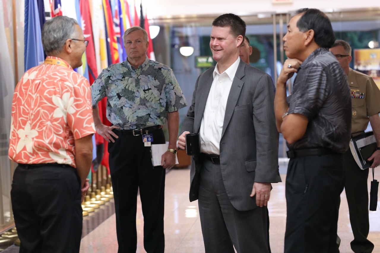 A DOD official meets with personnel from the Asia-Pacific Center for Security Studies.
