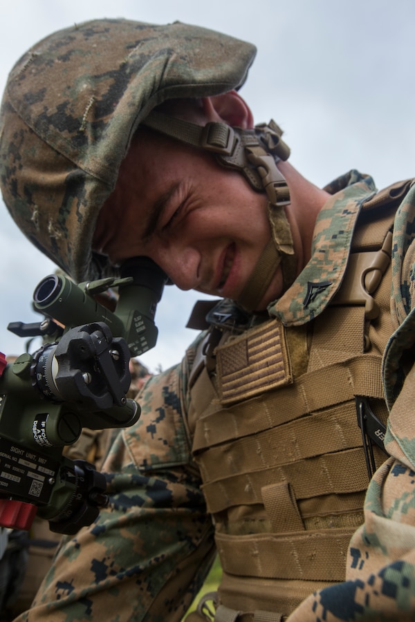Lance Cpl. Vince Walls, a mortarman with Lima Company, 3rd Battalion, 25th Marine Regiment, adjusts a M224 60mm Mortar during Exercise Northern Strike at Camp Grayling, Mich., Aug. 7, 2018. Exercise Northern Strike is a National Guard Bureau-sponsored training exercise that unites service members from multiple branches, states and coalition countries to conduct combined ground and air combat operations. (U.S. Marine Corps photo by Cpl. Niles Lee)
