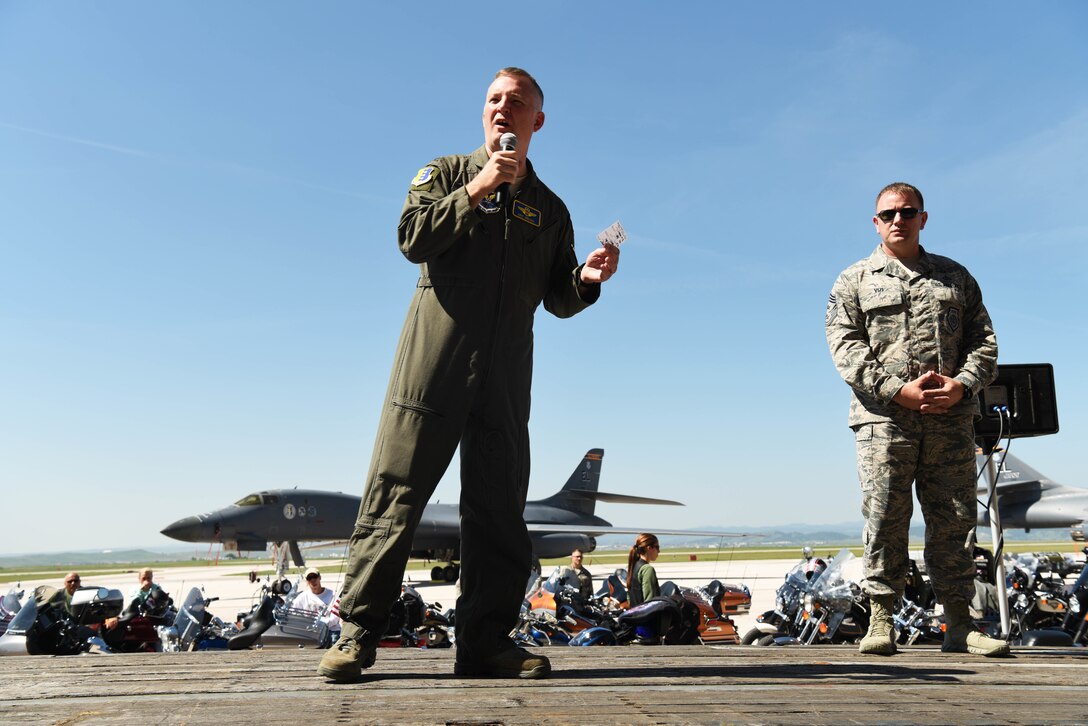 Col. Eric Hresko, the 28th Bomb Wing vice commander, addresses the participants of the Dakota Thunder Run at Ellsworth Air Force Base, S.D., Aug. 7, 2018. Over 150 participants rode 53 miles from Ellsworth AFB to the Sturgis Motorcycle Rally, where they helped kick off Military Appreciation Day events. (U.S. Air Force photo by Airman 1st Class Thomas Karol)