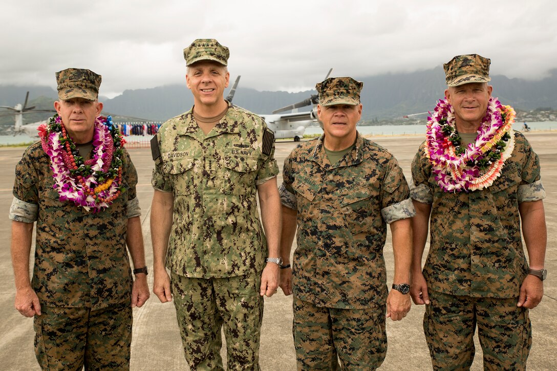 U.S. Marine Corps Lt. Gen. David H. Berger, left, outgoing commander of U.S. Marine Corps Forces, Pacific (MARFORPAC), U.S. Navy Adm. Phil Davidson, commander of U.S. Indo-Pacific command, Commandant of the Marine Corps Gen. Robert B. Neller, and Lt. Gen. Lewis A. Craparotta, incoming commander of MARFORPAC, pose for a photo after the MARFORPAC change of command ceremony at Marine Corps Base Hawaii, Aug. 8, 2018. The change of command ceremony represents the transfer of responsibility and authority over MARFORPAC between commanders.