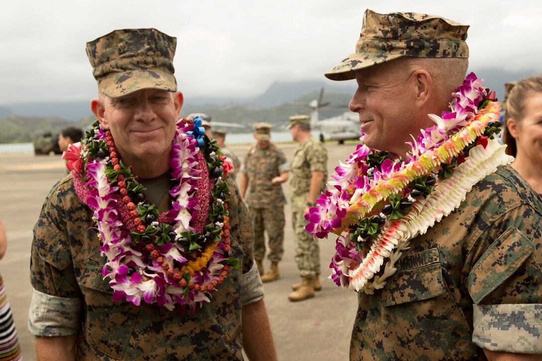 U.S. Marine Corps Lt. Gen. David H. Berger, left, outgoing commander of U.S. Marine Corps Forces, Pacific (MARFORPAC) and Lt. Gen. Lewis A. Craparotta, incoming commander of MARFORPAC, speak after the MARFORPAC change of command ceremony at Marine Corps Base Hawaii, Aug. 8, 2018. The change of command ceremony represents the transfer of responsibility and authority over MARFORPAC between commanders.