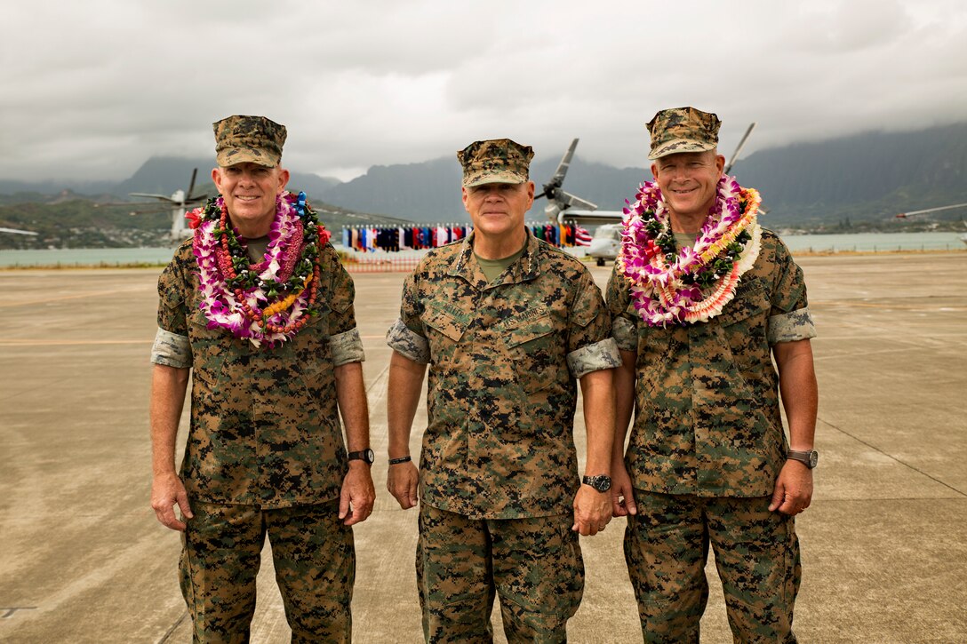 U.S. Marine Corps Lt. Gen. David H. Berger, left, outgoing commander of U.S. Marine Corps Forces, Pacific (MARFORPAC), Commandant of the Marine Corps Gen. Robert B. Neller, and Lt. Gen. Lewis A. Craparotta, incoming commander of MARFORPAC, pose for a photo after the MARFORPAC change of command ceremony at Marine Corps Base Hawaii, Aug. 8, 2018. The change of command ceremony represents the transfer of responsibility and authority over MARFORPAC between commanders.