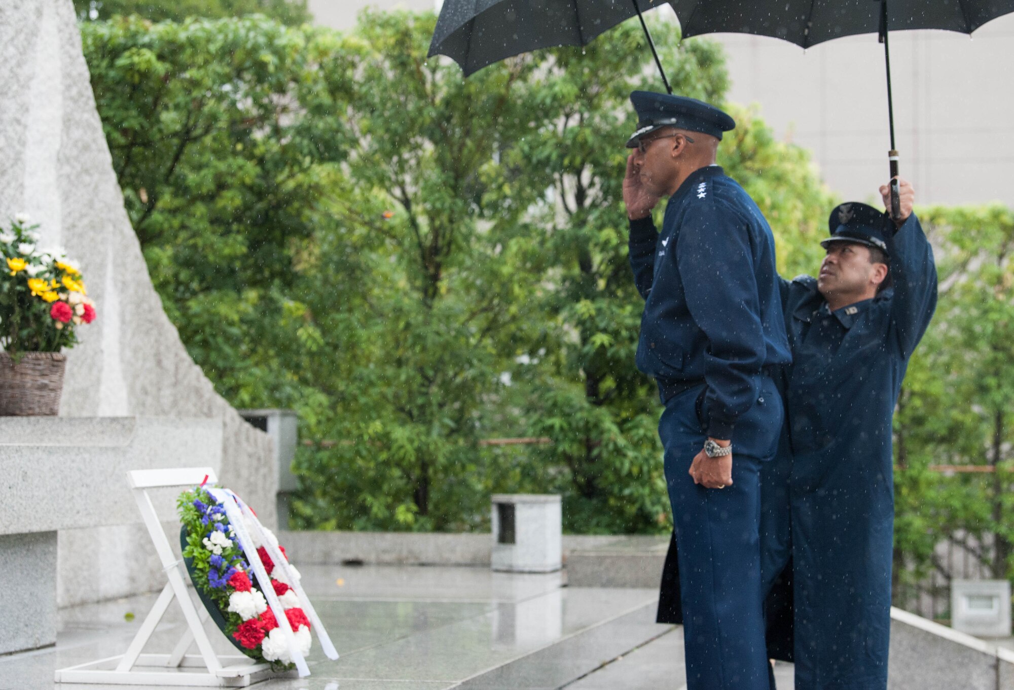 Gen. CQ Brown, Jr., Pacific Air Forces commander, renders a salute and pays his respects to the Japan Self Defense Force members who lost their lives while on duty, Ministry of Defense in Tokyo, Japan, Aug. 7, 2018. For more than 60 years, the U.S.-Japan alliance has been the cornerstone for stability and security in the region. (U.S. Air Force photo by Hailey Haux)