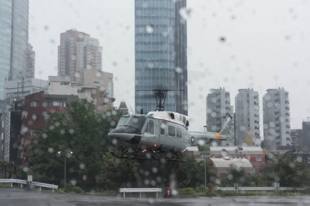 Gen. CQ Brown, Jr., Pacific Air Forces (PACAF) commander, departs Tokyo, Japan, in a UH-1, Aug. 8, 2018. In addition to security concerns, discussions throughout the general’s visit focused on opportunities to cooperate further in areas of fifth generation integration, ballistic missile defense, the employment of new operating concepts like PACAF’s agile combat employment, an expanding to more multilateral exercises and engagements with like-minded nations in the region. (U.S. Air Force photo by Hailey Haux)