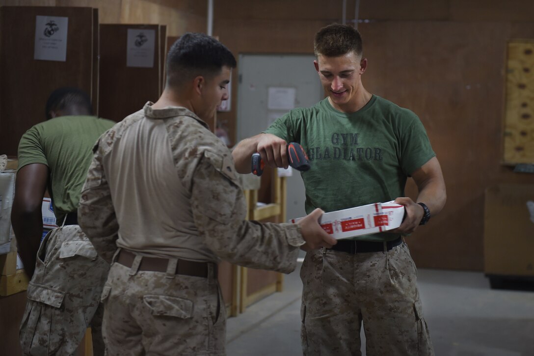 A marine scans a package