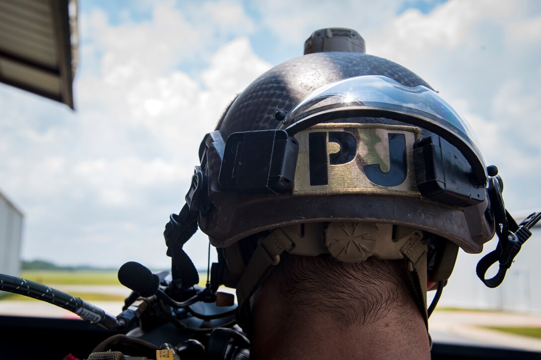 A Pararescueman (PJ) from the 38th Rescue Squadron (RQS), sits in a truck prior to a static-line jump, July 24, 2018, in Valdosta, Ga. PJs performed static-line jumps to maintain their jump proficiency qualifications. The mission of the 38th RQS is to employ combat ready rescue officers and pararescuemen to support units worldwide. (U.S. Air Force photo by Airman 1st Class Eugene Oliver)