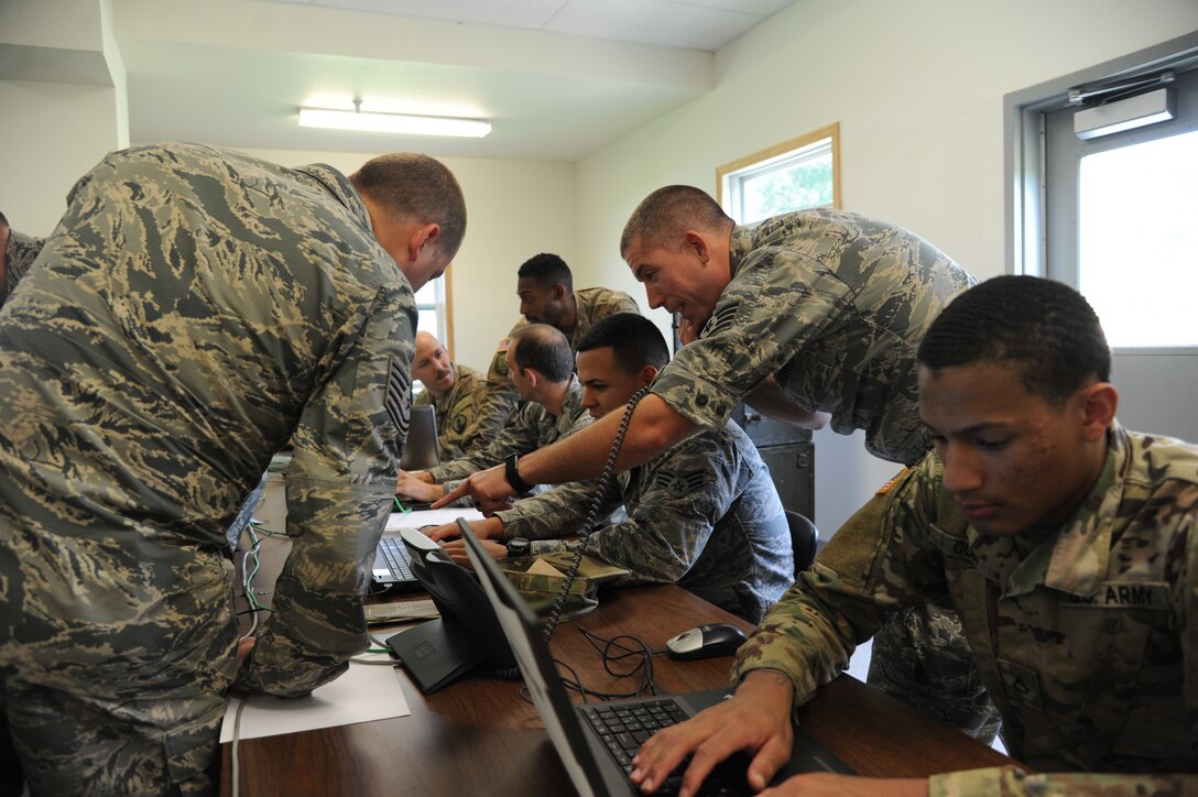 Airmen, soldiers and sailors work together during Exercise Patriot Warrior at Fort McCoy, Wis., Aug. 8, 2018. Patriot Warrior is designed to test the capabilities of the Air Force Reserve and its joint partners. Air Force photo by Staff Sgt. Xavier Lockley