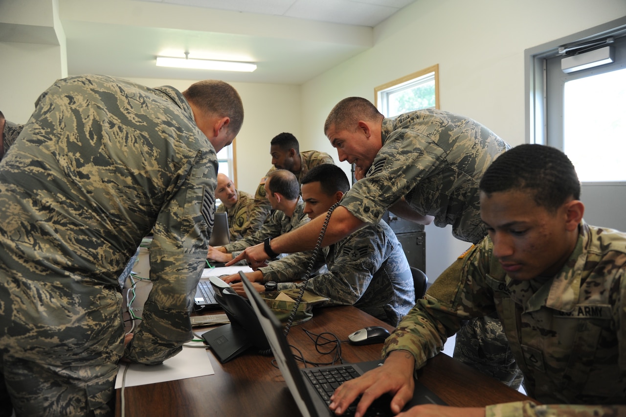 Airmen, soldiers and sailors work together during Exercise Patriot Warrior at Fort McCoy, Wis., Aug. 8, 2018. Patriot Warrior is designed to test the capabilities of the Air Force Reserve and its joint partners. Air Force photo by Staff Sgt. Xavier Lockley
