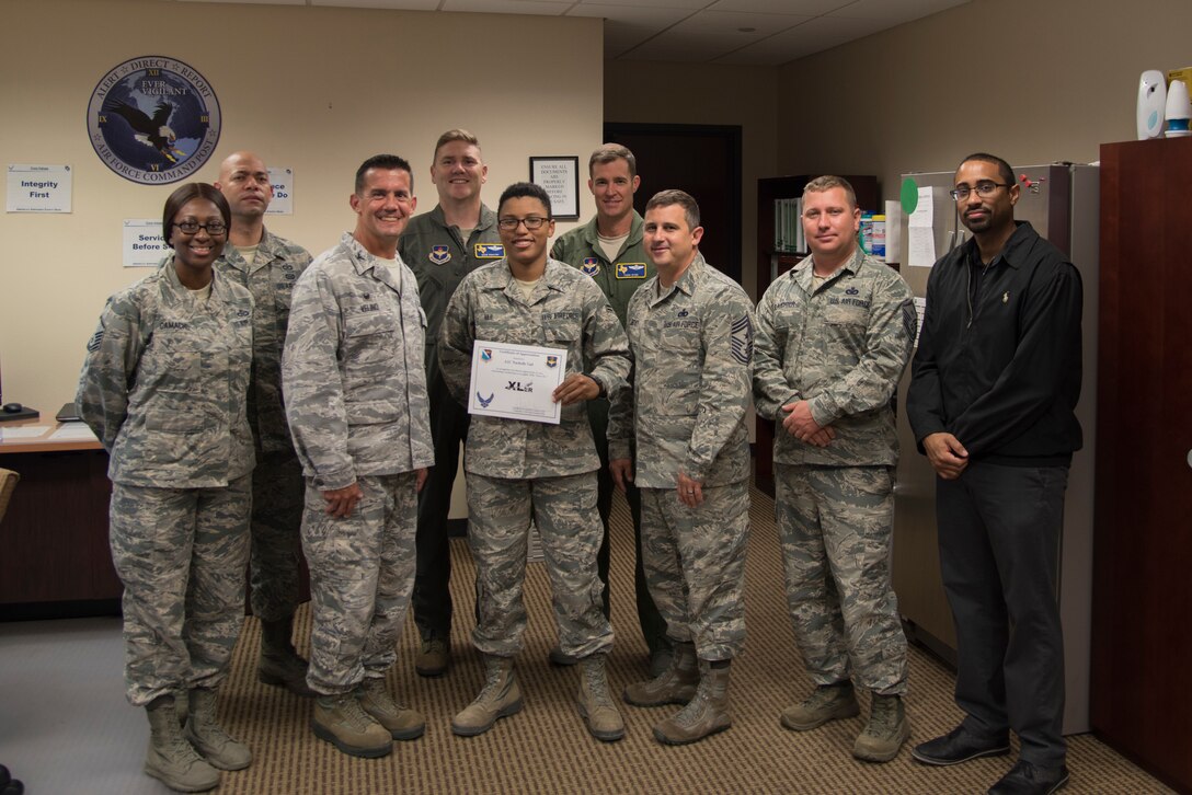 Airman 1st Class Nachelle Vail, 47th Flying Training Wing emergency actions controller, was chosen by wing leadership to be the “XLer” of the week, for the week of July, 30, 2018, at Laughlin Air Force Base, Texas. The “XLer” award, presented by Col. Charlie Velino, 47th Flying Training Wing commander, is given to those who consistently make outstanding contributions to their unit and the Laughlin mission. (U.S. Air Force photo by Airman 1st Class Daniel Hambor)