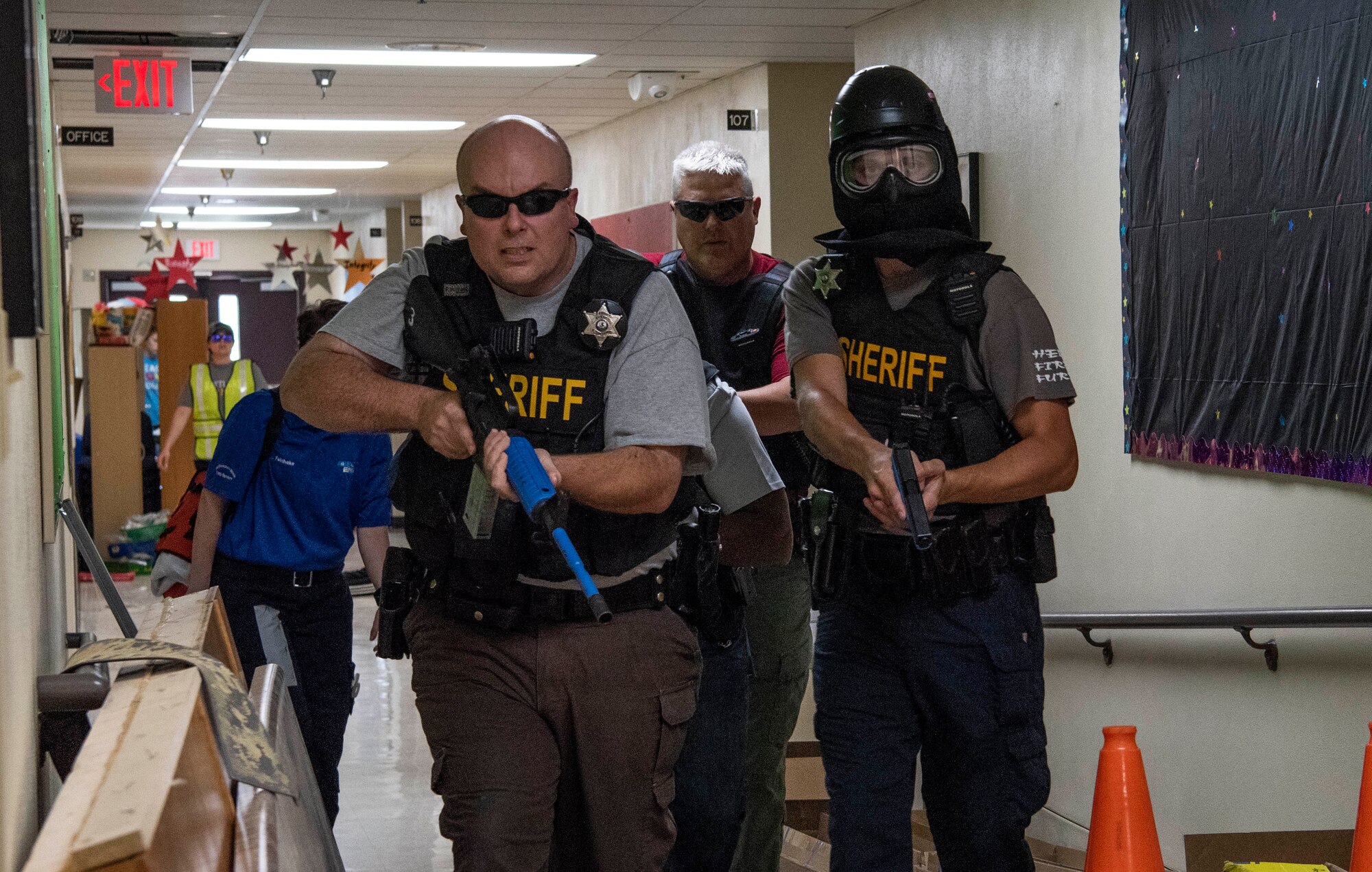 Local law enforcement participate in an active shooter exercise July 24, 2018, at Whiteside Elementary School, Belleville, Illinois. By developing and rehearsing a comprehensive active shooter plan, leadership can better protect their employees from an active shooter incident.