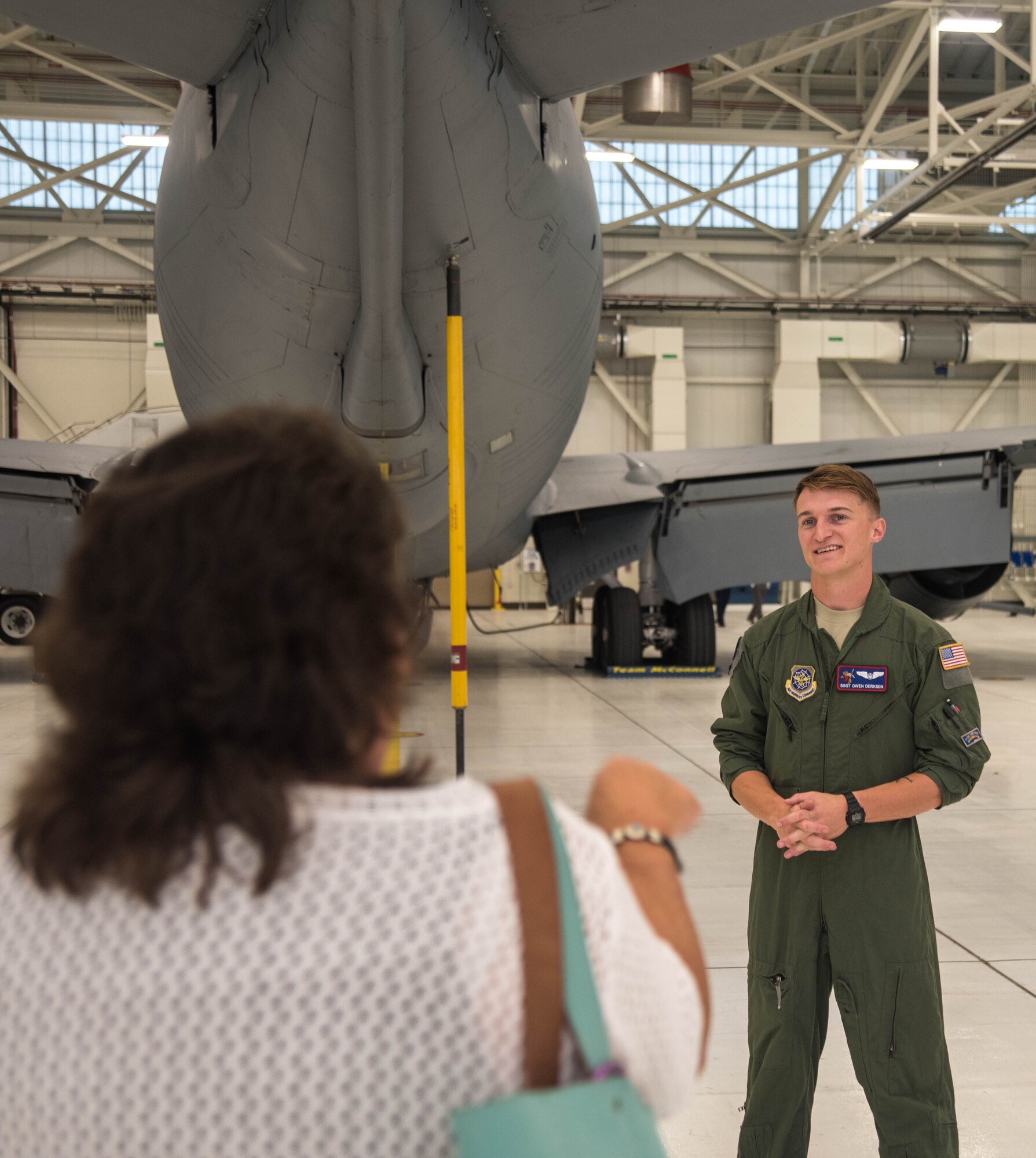 Staff Sgt. Owen Derksen, 349th Air Refueling Squadron boom operator, speaks to leaders and historic preservation staff from five Native American tribes Aug. 7, 2018, at McConnell Air Force Base, Kansas. The tribal representatives visited McConnell to communicate their interests to base leadership, they then attended a mission brief, base tour and a community visit to the local Mid-America All-Indian Center. (U.S. Air Force photo by Staff Sgt. Chris Thornbury)