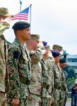 Officers from the 96th Troop Command, Washington Army National Guard, and the 15th Royal Malay Regiment, 3rd Division, Malaysian Army, salute during the closing ceremony of Exercise Keris Strike 2018, Aug. 3, 2018. Keris Strike 2018 is a bilateral exercise between the U.S. and Malaysia that focuses on humanitarian disaster relief efforts.