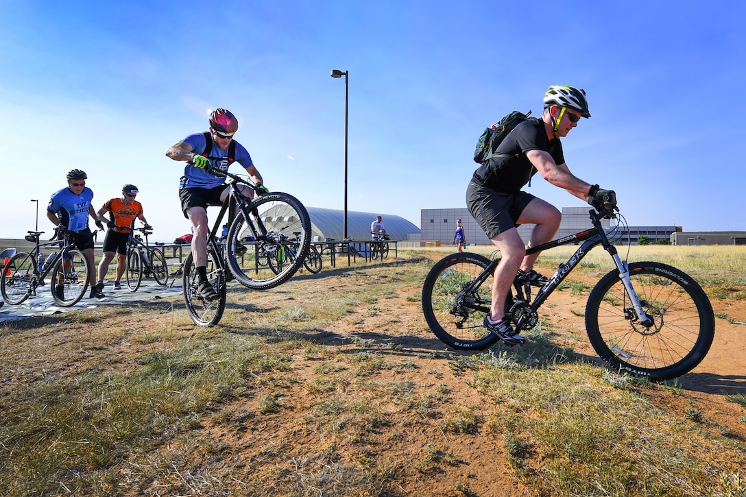 Bicyclists race during an annual athletic event.