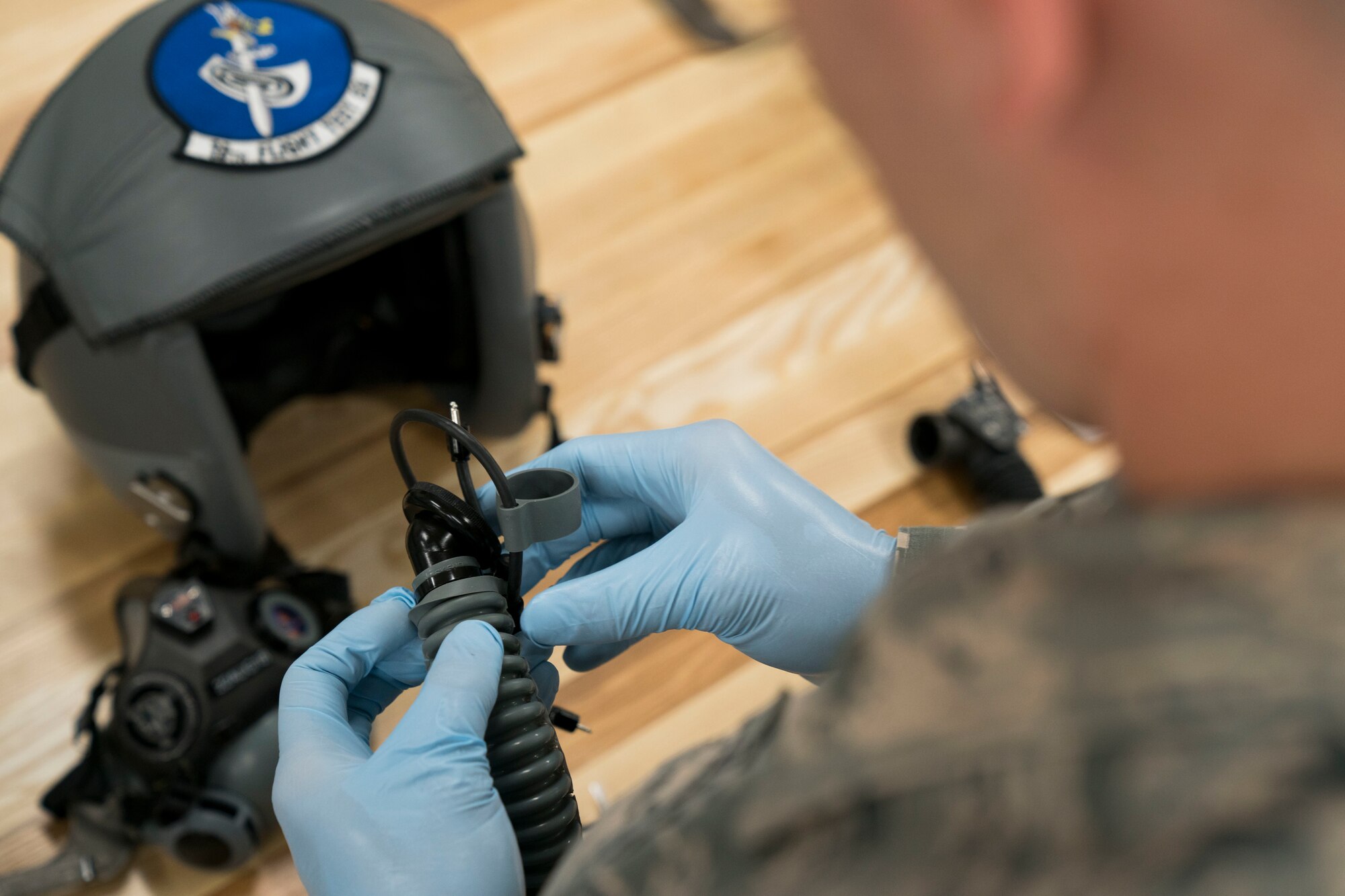 Staff Sgt. Miles Warwick inspects AFE equipment.