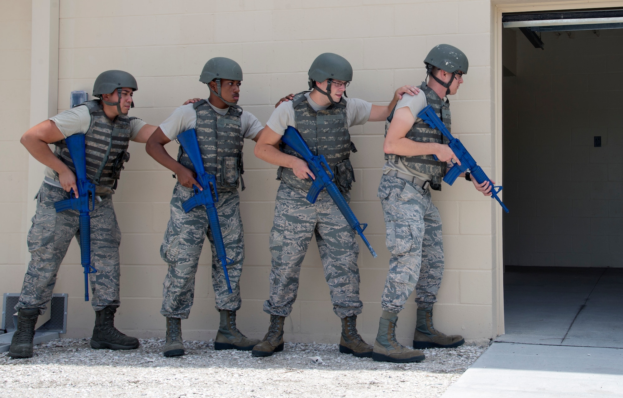 U.S. Air Force 6th Security Forces Squadron augmentees participate in a room clearing exercise at MacDill Air Force Base, Fla., July 25, 2018.