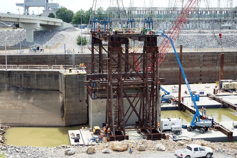 The U.S. Army Corps of Engineers Nashville District and its contractor partner Johnson Brothers put a 1.3 million pound concrete shell into position Aug. 6, 2018 on the riverbed on downstream end of Kentucky Lock where it will be part of a coffer dam and eventually a permanent part of the new lock wall for the Kentucky Lock Addition Project. It is the first of 10 shells that will be placed over the next year. The lock is located at Kentucky Dam, which is a Tennessee Valley Authority project at Tennessee River mile 22.4. (USACE Photo by Mark Rankin)