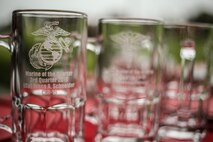 U.S. Marines and Sailors with 1st Marine Logistics Group receive cups of recognition for their outstanding accomplishments during an award ceremony at Camp Pendleton, Calif., July 26, 2018. During the awards ceremony, Marines and Sailors received different awards for their hard work and dedication. (U.S. Marine Corps photo by Pfc. Timothy Shoemaker)