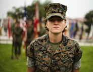 U.S. Marine Lance Cpl. Grace Schneider, a motor transportation operator with 1st Maintenance Battalion, Combat Logistics Regiment 15, 1st Marine Logistics Group, receives the Marine of the Quarter Award during an awards ceremony at Camp Pendleton, Calif., July 26, 2018. She received the award for her outstanding work performance and dedication while performing her duties as a motor transportation operator. (U.S. Marine Corps photo by Pfc. Timothy Shoemaker)