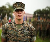 U.S. Navy Petty Officer 3rd Class Jared Formulak, a field medical technician with 1st Medical Battalion, 1st Marine Logistics Group, receives the Blue Jacket of the Quarter Award during an awards ceremony at Camp Pendleton, Calif., July 26, 2018. He received the Blue Jacket Award for his enthusiasm, professionalism, and unwavering devotion to duty. (U.S. Marine Corps photo by Pfc. Timothy Shoemaker)