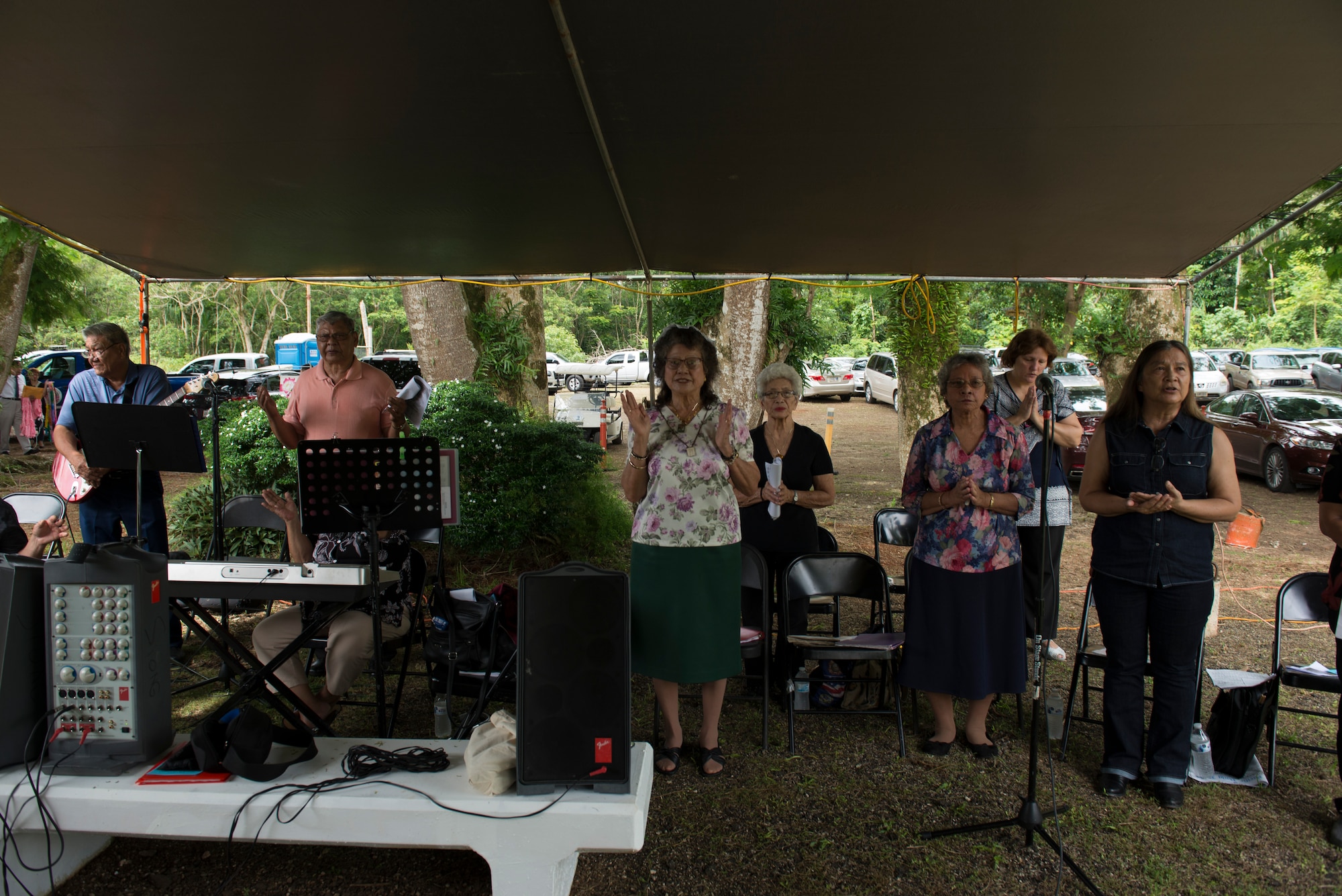 The "Our Lady of Lourdes" Heritage Choir sings during mass before the Chaguian Massacre Memorial Ceremony August 8, 2018, in Yigo, Guam. The ceremony is observed each year in order to honor the memory of the Chamorro men who lost their lives in the massacre. (U.S. Air Force photo by Tech. Sgt. Jake M. Barreiro)