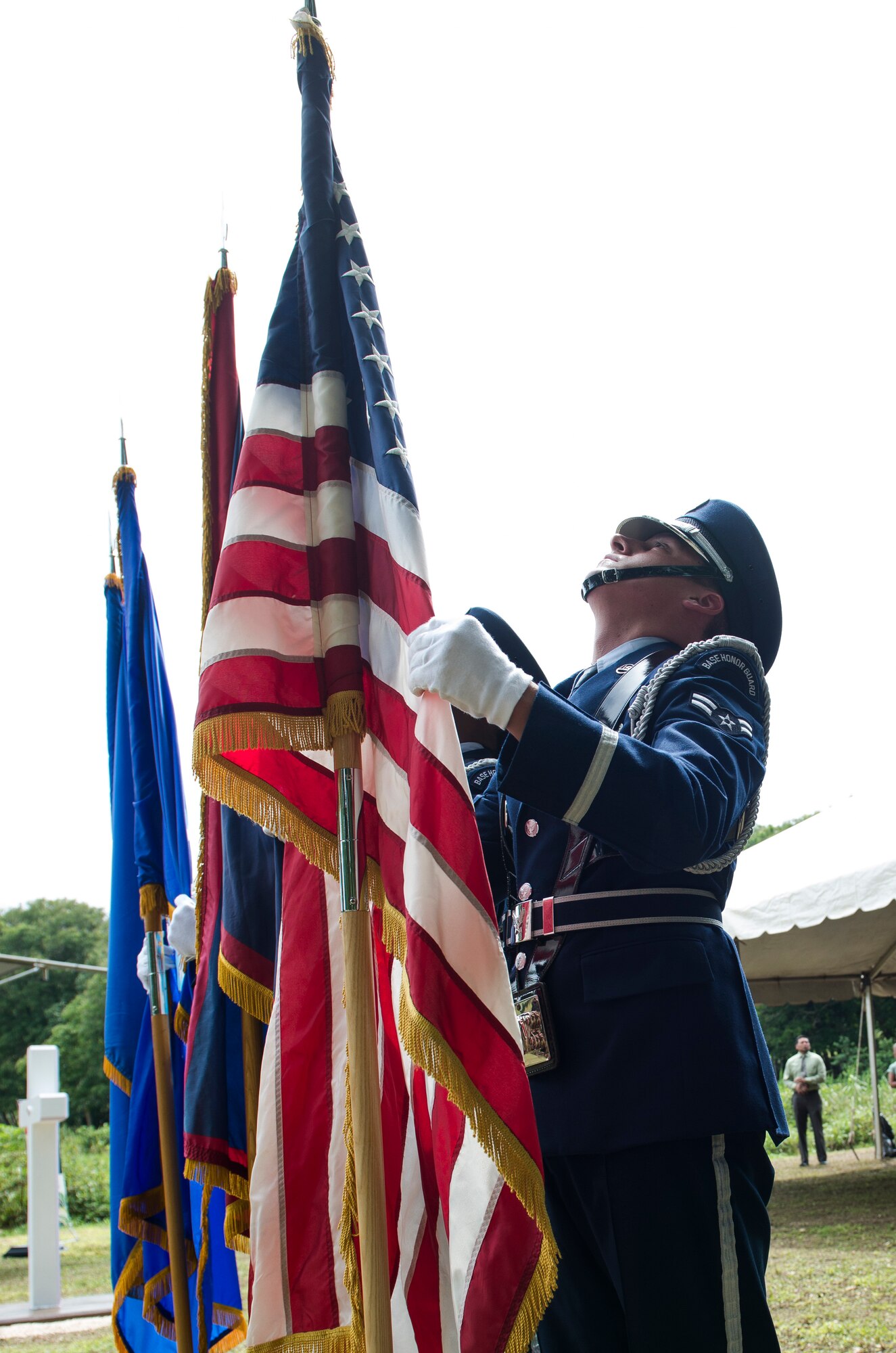The Andersen Air Force Base Honor Guard posts the colors during the Chaguian Massacre Memorial August 8, 2018, in Yigo, Guam. The memorial commemorated the lives of 45 Chamorro men who were executed at the site in the wake of World War II. (U.S. Air Force photo by Tech. Sgt. Jake M. Barreiro)