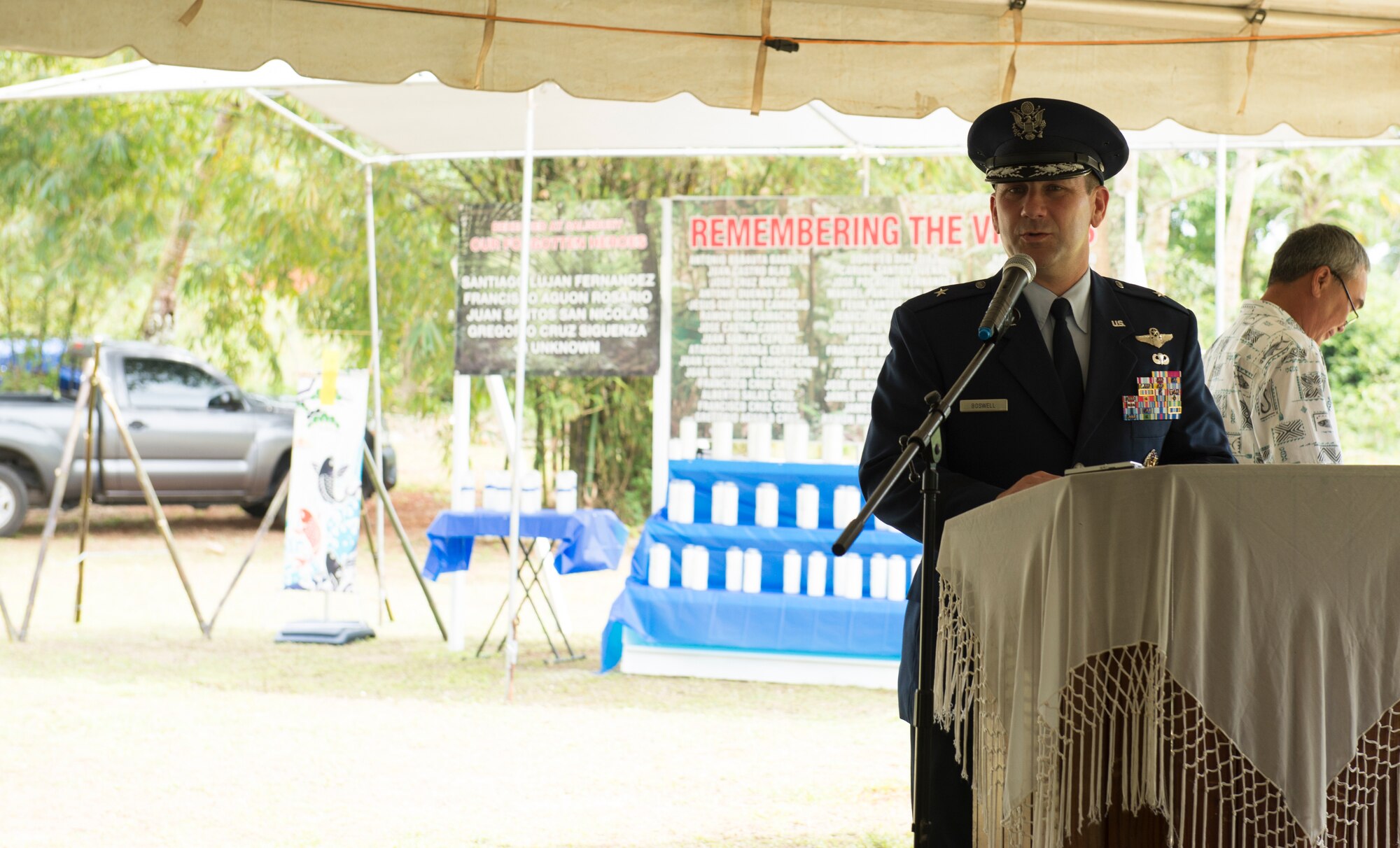 Brig. Gen. Gentry Boswell, 36th Wing commander, delivers a speech at the Chaguian Massacre Memorial August 8, 2018, in Yigo, Guam. Boswell spoke at the ceremony which was attended by service members from all around Guam as well as locals of the island and Japanese dignitaries. (U.S. Air Force photo by Tech. Sgt. Jake M. Barreiro)