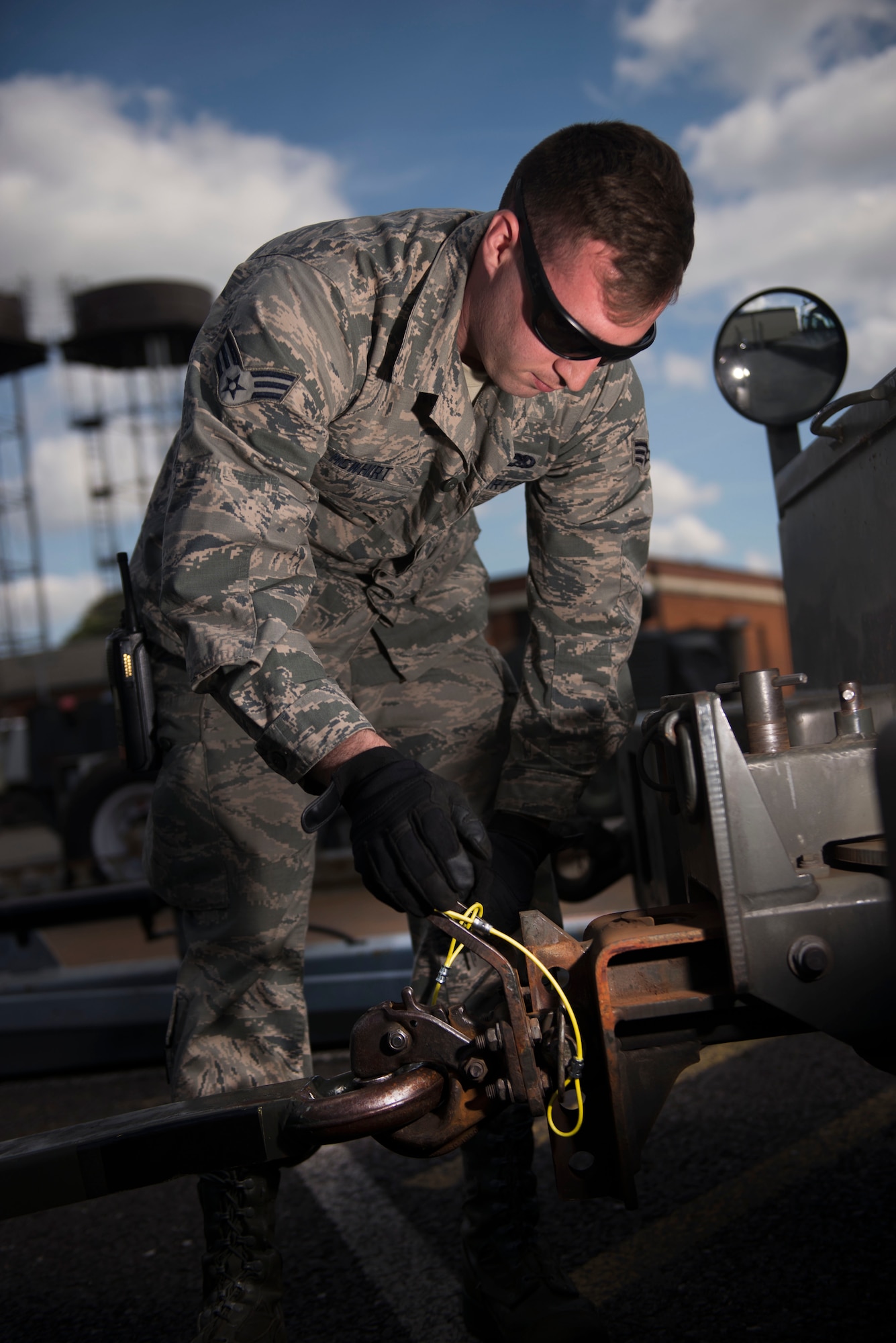 U.S. Air Force Senior Airman Michael McWhirt, 100th Maintenance Squadron aerospace ground equipment journeyman, attaches a diesel generator to a truck to bring to out to the flightline to power a KC-135 Stratotanker at RAF Mildenhall, England, May 8, 2018. A series of inspections must be completed before any aircraft can use the generator, which are an instrumental part in powering the KC-135 Stratotankers on the ground. (U.S. Air Force photo by Airman 1st Class Alexandria Lee)