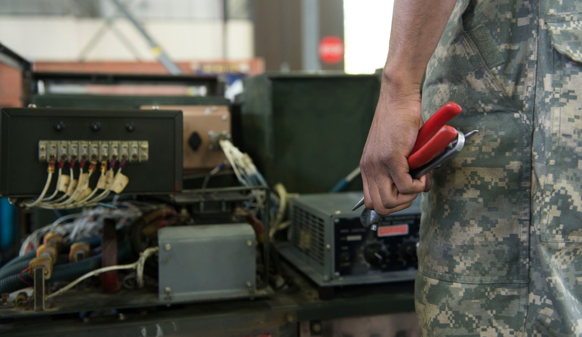 U.S. Air Force Senior Airman Lamar Cotton, 100th Maintenance Squadron aerospace ground equipment journeyman, fixes a diesel generator’s damaged power plane by replacing a damaged harness at RAF Mildenhall, England, May 8, 2018. Aerospace ground equipment Airmen maintain a variety of essential equipment such as generators, heaters and flood lights, all are essential for crew chiefs and other flightline Airmen to do their jobs and keep the mission going. (U.S. Air Force photo by Airman 1st Class Alexandria Lee)