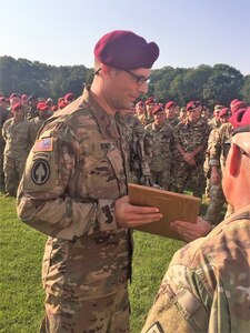 Army Master Sgt. William Stout, Md. National Guard Special Operations Detachment, takes first place, out of 300 paratroopers, in the individual jump event with a time of two seconds during Leapfest in West Kingston, R.I., Aug 5, 2018.