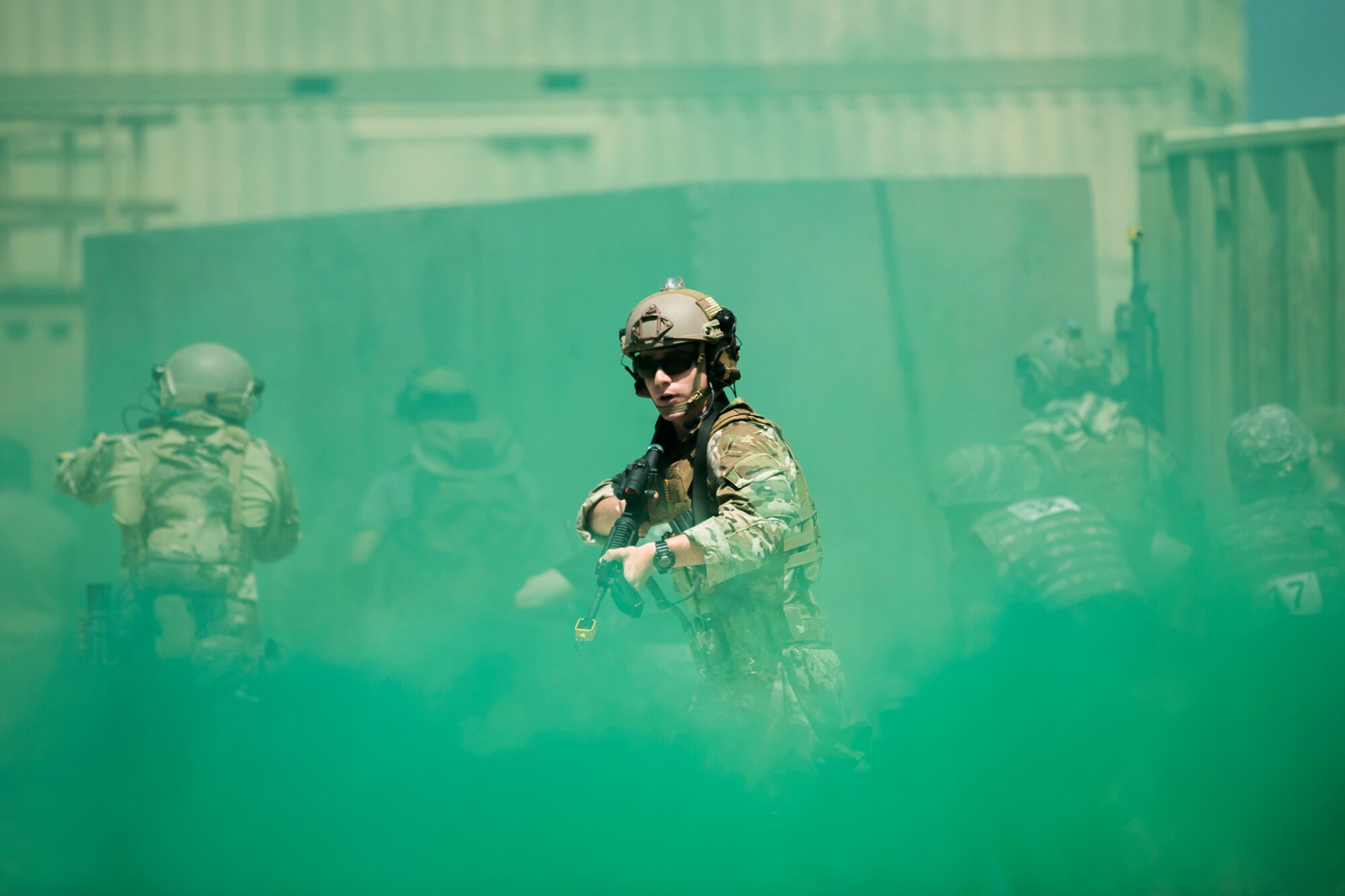 An Airman checks behind a simulated military escort for combatants at the Emergency Medical Technician Rodeo at Melrose Air Force Range, N.M., August 8, 2018. A total of 21 Air Force bases from around the world visited MAFR and Cannon Air Force Base, New Mexico, to participate in the EMT Rodeo, giving the technicians a wide assortment of scenarios to test their knowledge and training in the medical field. (U.S. Air Force photo by Airman 1st Class Gage Adison Daniel)