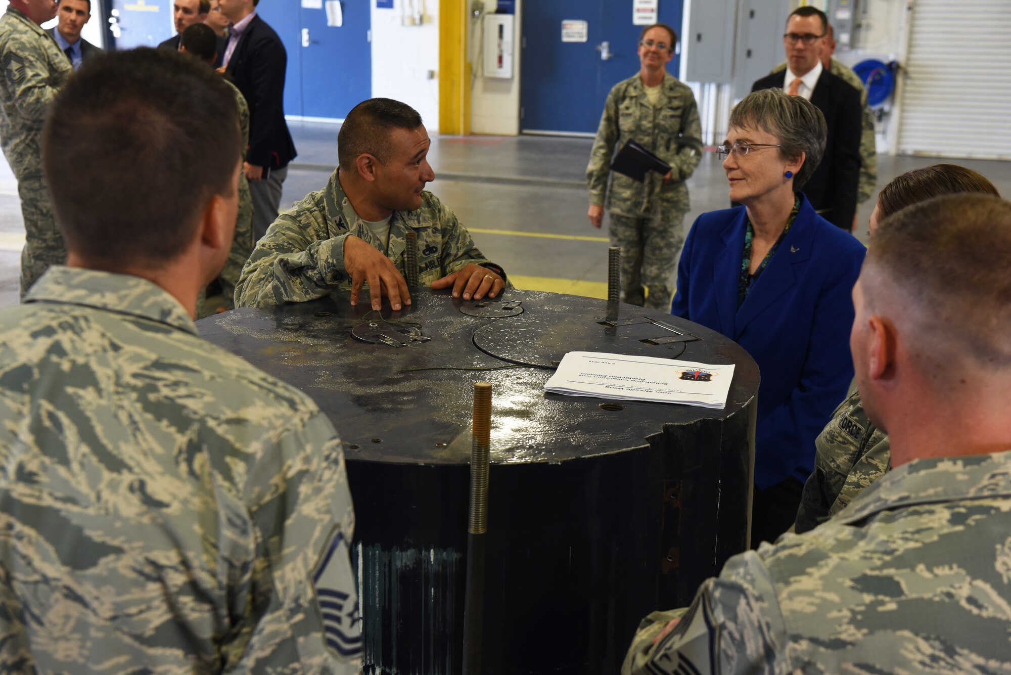 Col. Brian Rico, 90th Maintenance Group commander, discusses maintenance operations with Secretary of the Air Force Heather Wilson during her tour Aug. 8, 2018, at F.E. Warren Air Force Base, Wyo. The 90th MXG is charged with providing world-class maintenance for the 90th Missile Wing’s Minuteman III Intercontinental Ballistic Missiles and the facilities that house them in support of U.S. Strategic Command requirements. Wilson visited the base to emphasize the importance of the wing’s deterrence mission and to thank the Airmen for ensuring it is accomplished safely, securely and effectively every day. (U.S. Air Force photo by Senior Airman Breanna Carter)