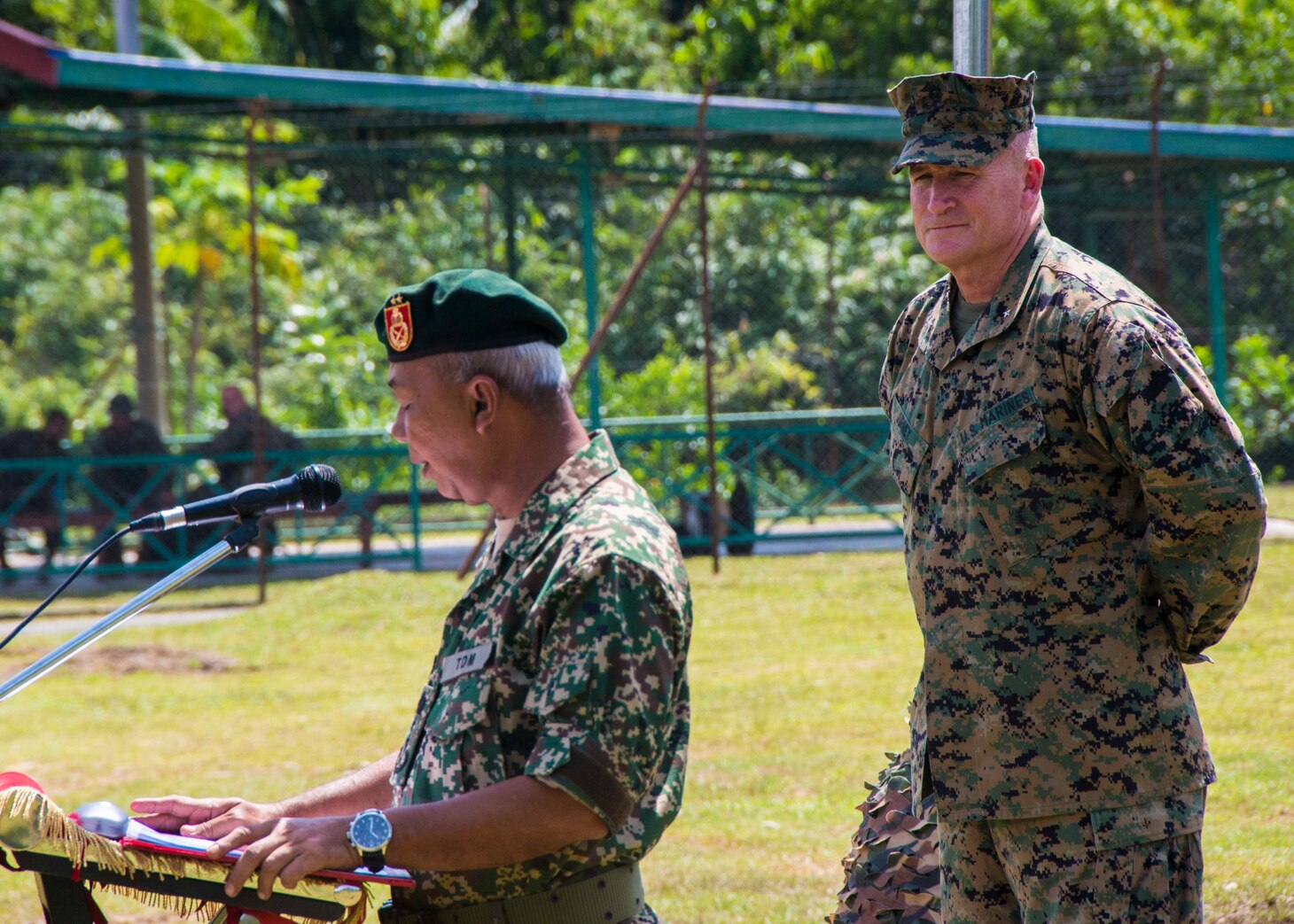 KOTA KINABALU, Malaysia (August 10, 2018) - Brig. Gen. William Jurney, Commanding General of 3rd Marine Infantry Division, stands by while Maj. Gen. Dato� Zulkapri bin Rahamat, General of Officer Commanding Task Force 450, provides his opening remarks during the opening ceremony of Cooperation Afloat Readiness and Training (CARAT) Malaysia on Kota Belud Marine Base. CARAT Malaysia in its 24th iteration, is designed to enhance information sharing and coordination, build mutual warfighting capability and support long-term regional cooperation enabling both partner armed forces to operate effectively together as a unified maritime force.