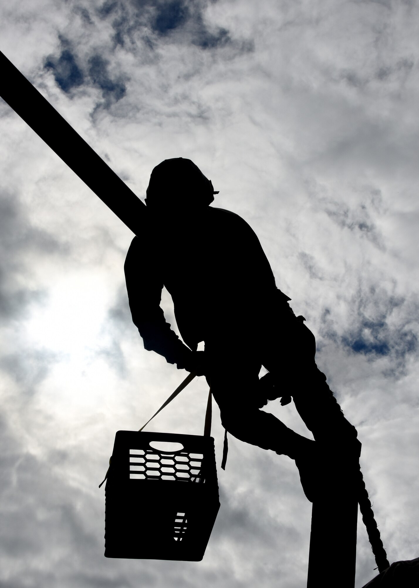 Tech Sgt. Eric Decker, a mental health medical technician with the Areomedical Staging Squadron at at the Pittsburgh International Airport Air Reserve Station, climbes across a pole during a Leadership course at Camp Dawson, West Virginia June 22, 2018. The Aeromedical Staging Squadron and the Areomedical Evacuation Squadron went to Camp Dawson, West Virginia to train together as they are opposite sides of the same mission. (U.S. Air Force Photo By Senior Airman Grace Thomson)