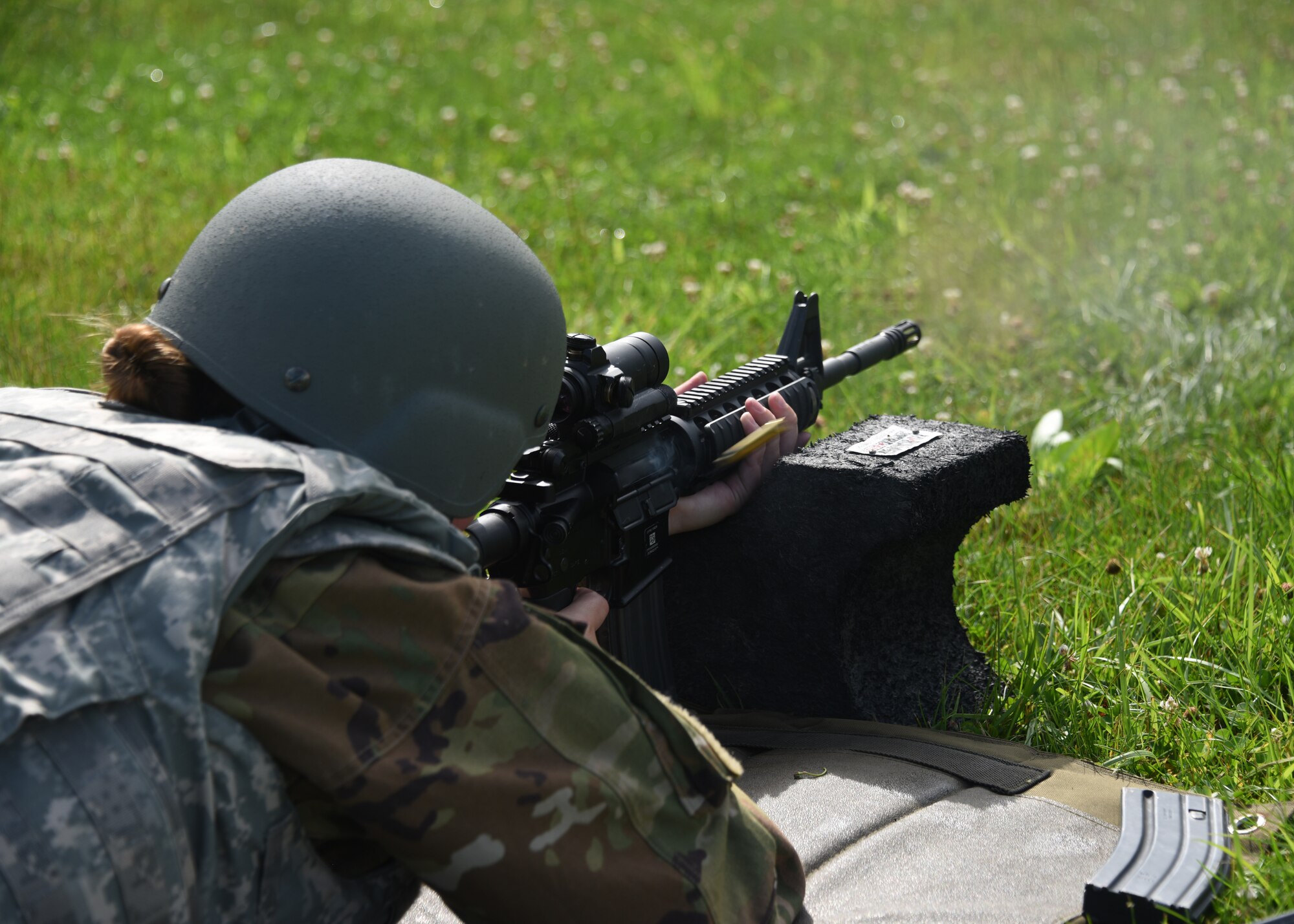 Senior Airmen Jordan Kinley, a medical technician with the Pittsburgh International Airport Air Reserve Station’s Aeromedical Evacuation Squadron fires an M-4 rifle at Camp Dawson, West Virginia June 19, 2018. As a medical technician Kinley only needs to qualify on the M-9 pistol in order to be combat ready. (U.S. Air Force Photo by Senior Airman Grace Thomson)