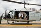 Staff Sgt. Cody Nickell, 374th Security Forces Squadron military working dog handler, works with Topa, 374th SFS MWD, to get him accustomed to being inside a UH-1N helicopter during a 459th Airlift Squadron MWD familiarization flight July 26, 2018, at Yokota Air Base, Japan. Flying in a helicopter can be hard for the MWDâ€™s due to the noise and vibrations, but once the MWDs become comfortable with the aircraft, they can be transported quickly and efficiently to wherever needed. (U.S. Air Force photo by Senior Airman Donald Hudson)