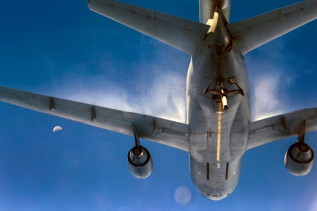 A KC-10 Extender, crewed by Reserve Airmen with the 76th Air Refueling Squadron, creates vapor contrails during a training mission over the East Coast Aug. 4, 2018. The 76th ARS is an Air Force Reserve Command unit located at Joint Base McGuire-Dix-Lakehurst, N.J. (U.S. Air Force photo by Master Sgt. Mark C. Olsen)